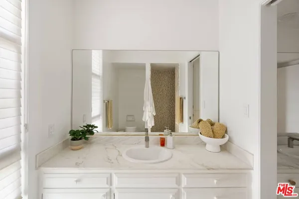 a bathroom with a shower curtain