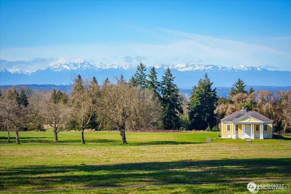a view of a house with a big yard