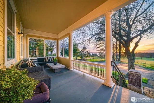 a view of swimming pool with outdoor seating