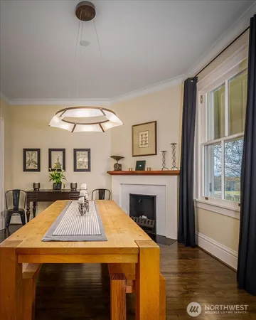 a open kitchen with a table and chairs in it