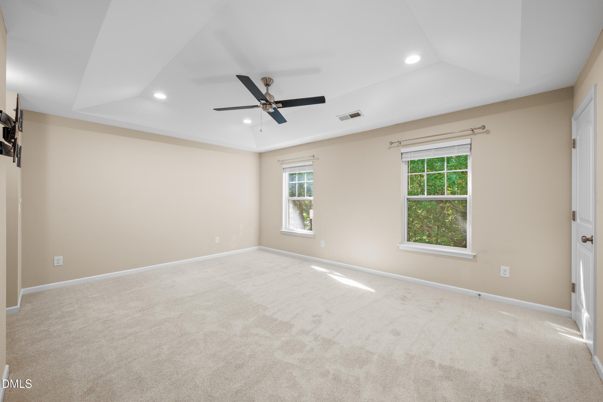 1217 Silver Beach Way Raleigh, NC 27606 - Photo 17 of 32 a view of an empty room with a window