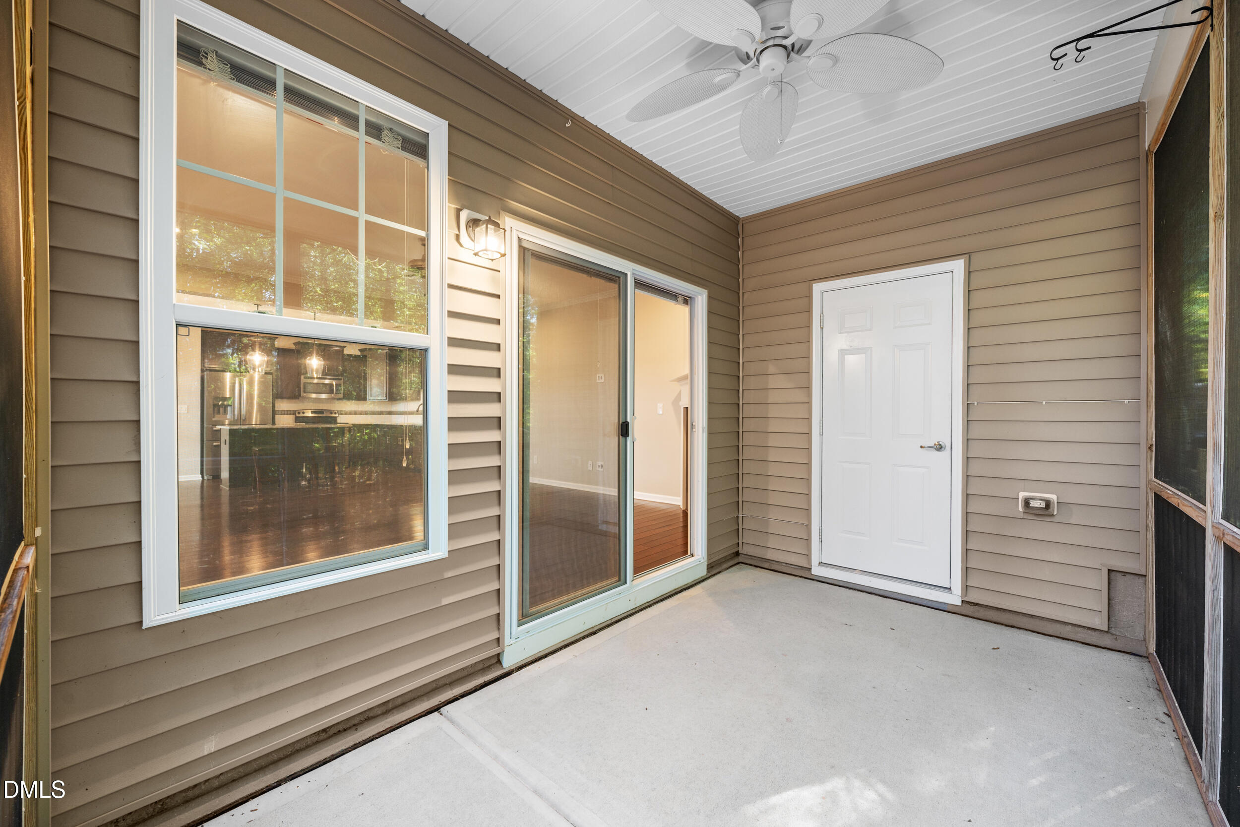 1217 Silver Beach Way Raleigh, NC 27606 - Photo 31 of 32 a view of a hallway with a glass door