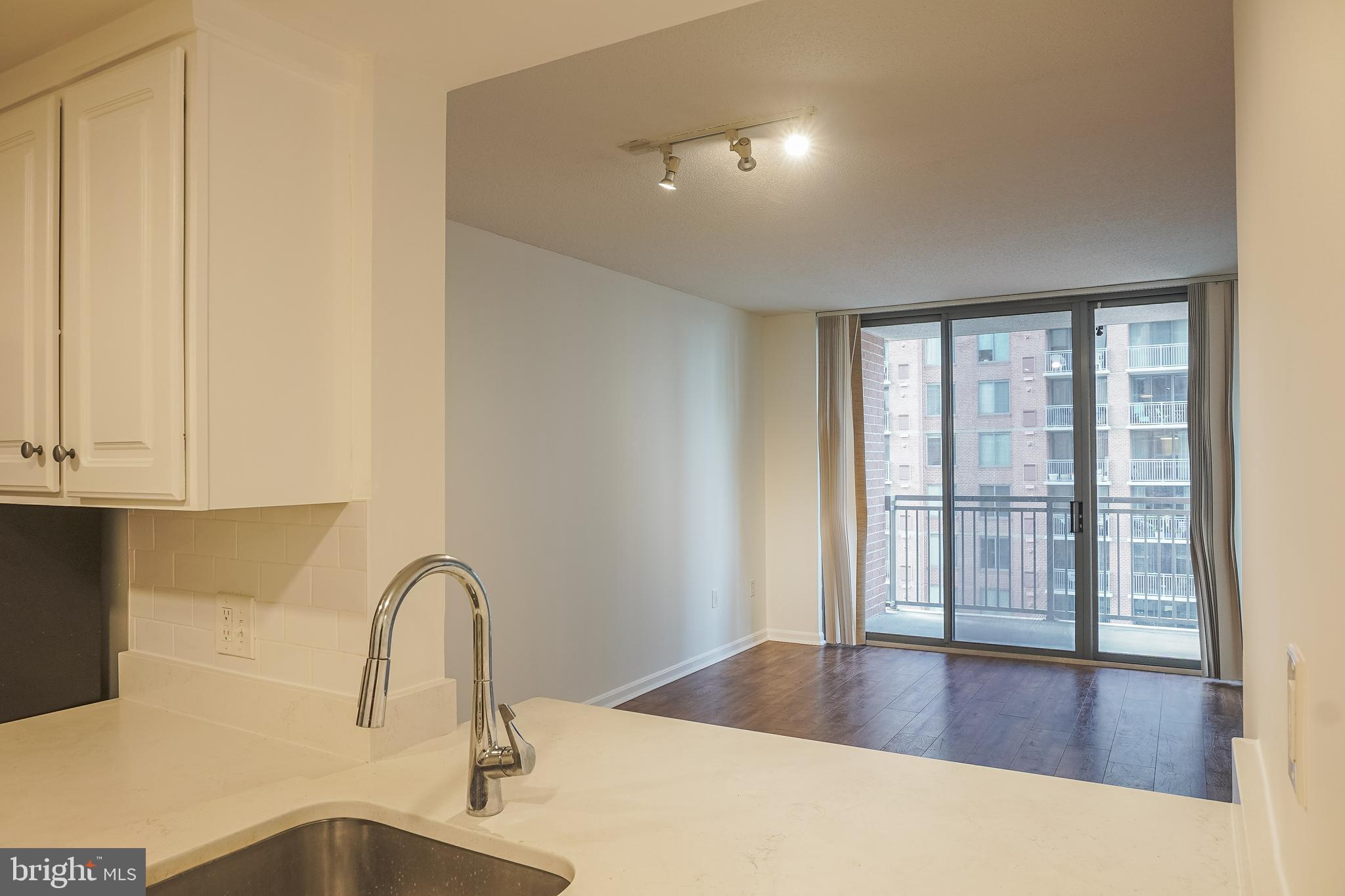 11710 Old Georgetown Road, Unit 809 North Bethesda, MD 20852 - Photo 14 of 52 Kitchen to Living/Dining Room to Balcony