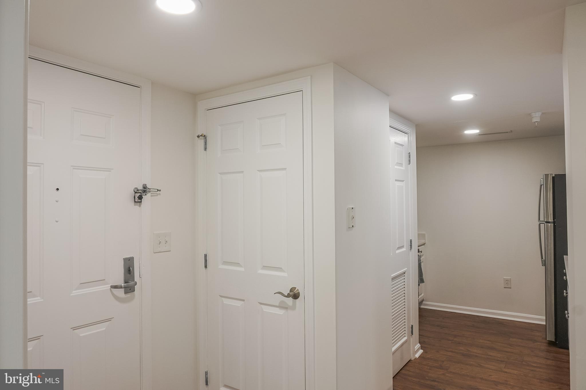 11710 Old Georgetown Road, Unit 809 North Bethesda, MD 20852 - Photo 6 of 52 Foyer to Kitchen