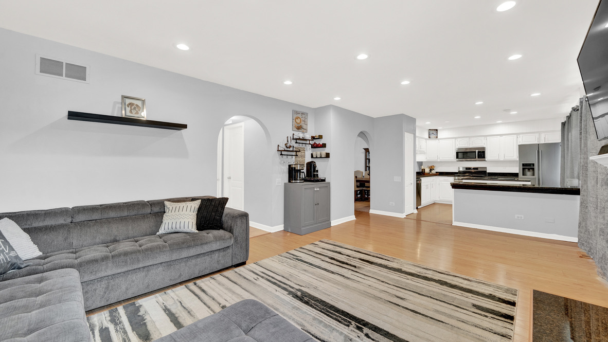 Undisclosed Address Palatine, IL 60067 - Photo 10 of 27 a living room with furniture and kitchen view
