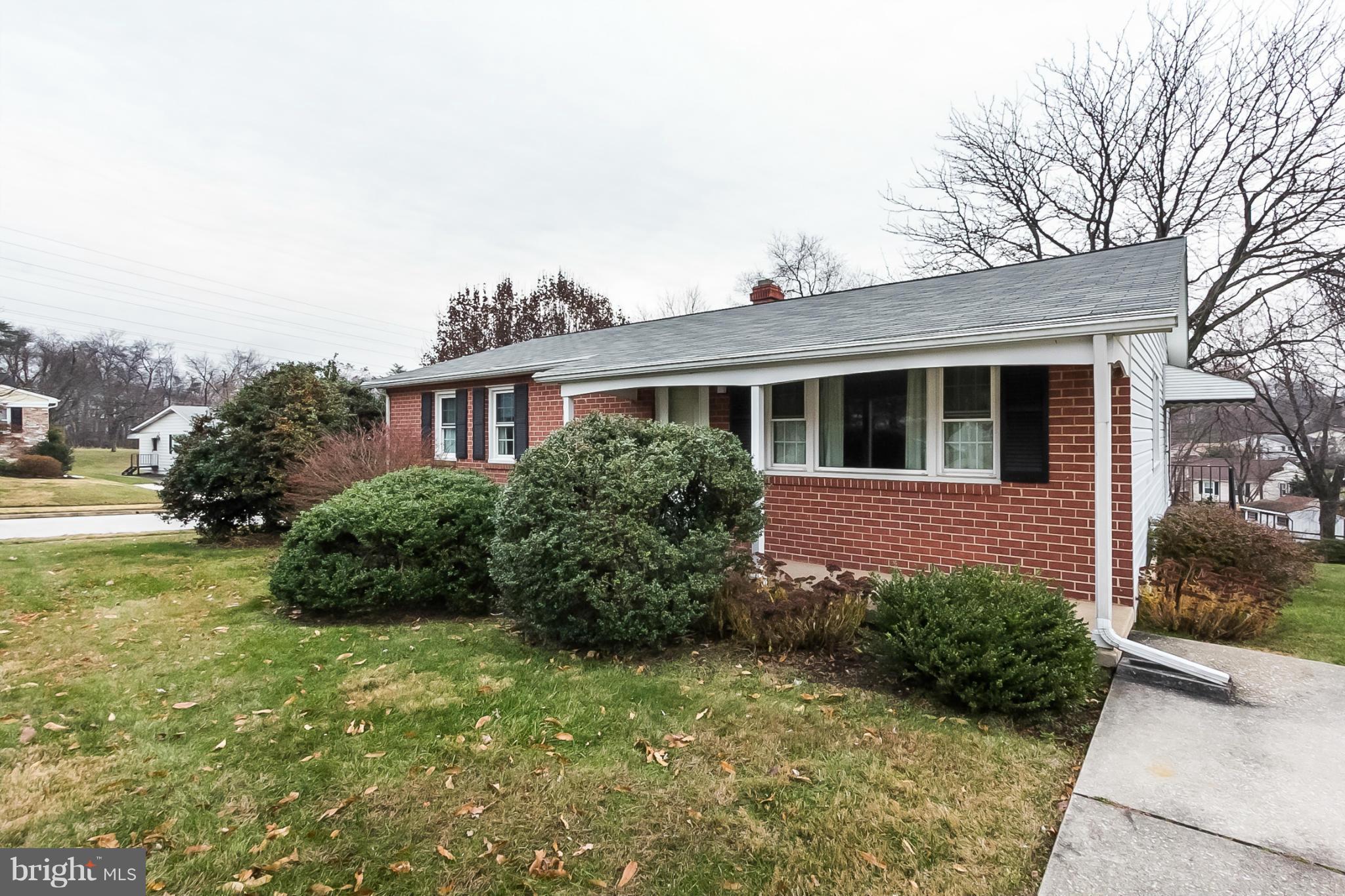 6738 Fordcrest Road Baltimore, MD 21237 - Photo 2 of 28 a front view of a house with garden