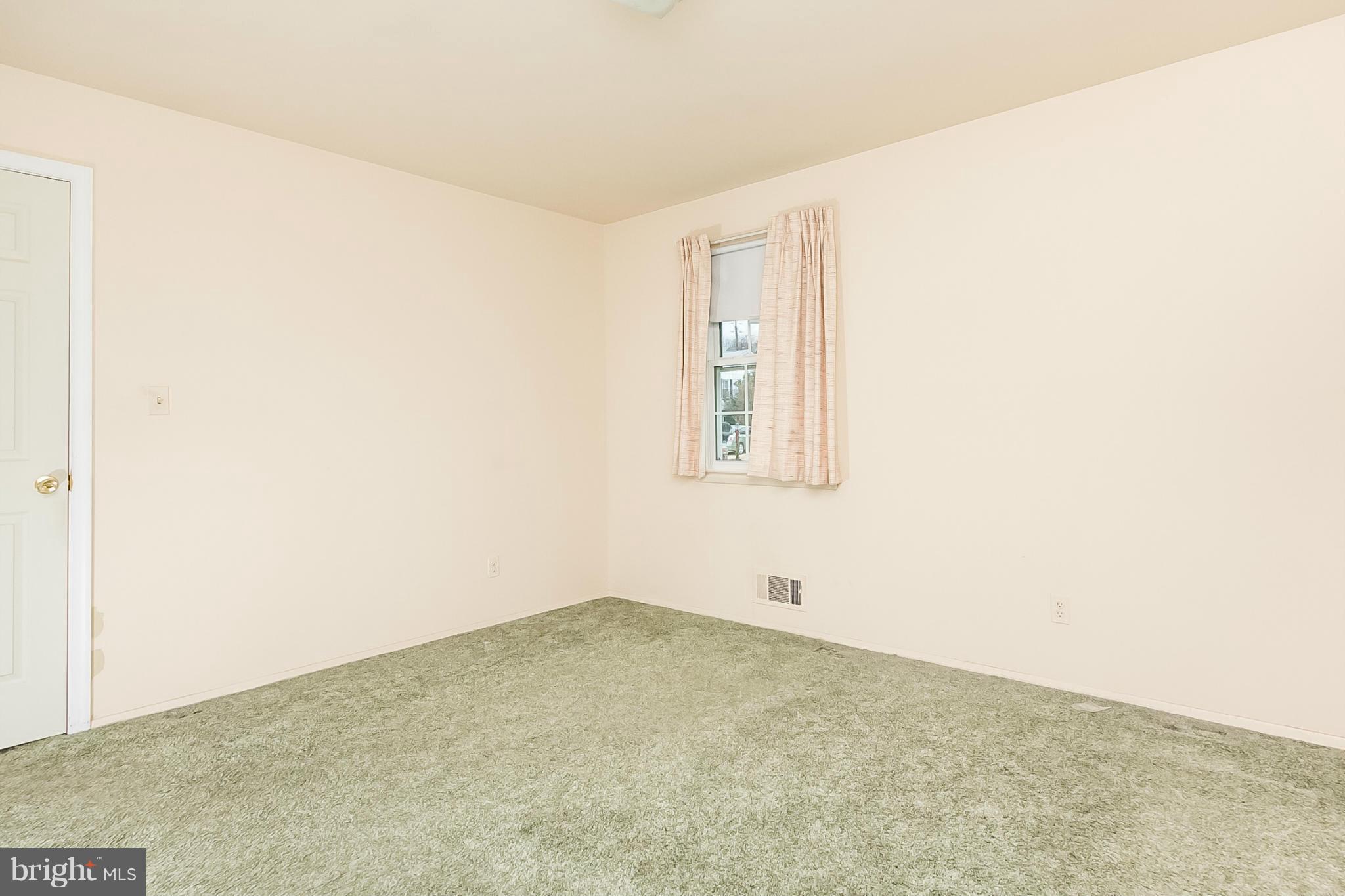 6738 Fordcrest Road Baltimore, MD 21237 - Photo 14 of 28 a view of a room that has a window in it