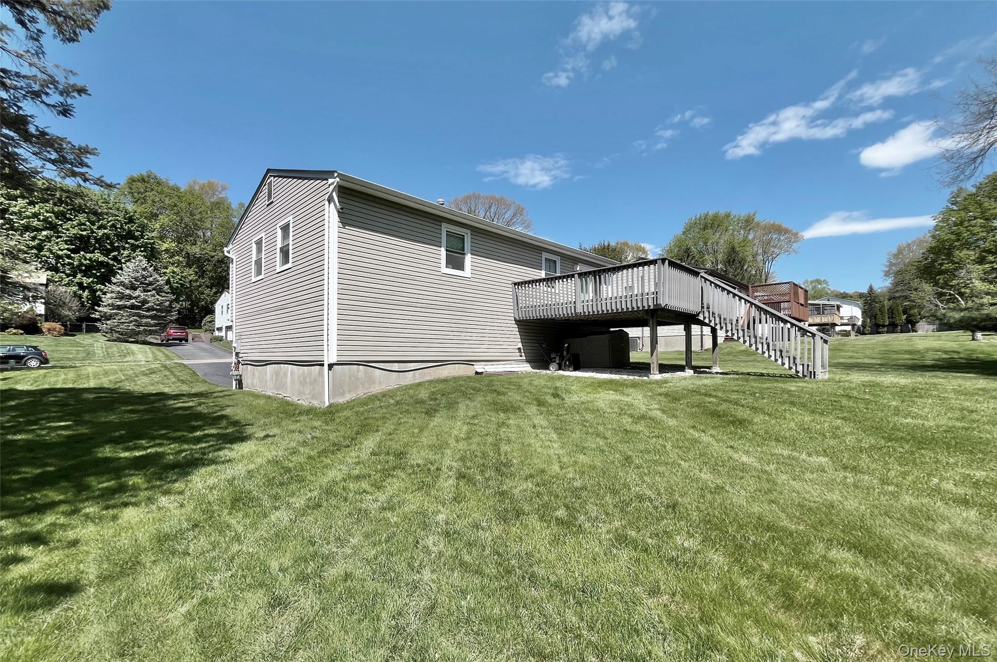 554 High Street Monroe, NY 10950 - Photo 2 of 29 a view of a house with a yard