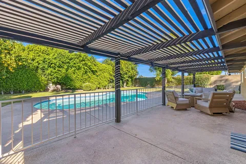 a view of a house with a snow in the yard