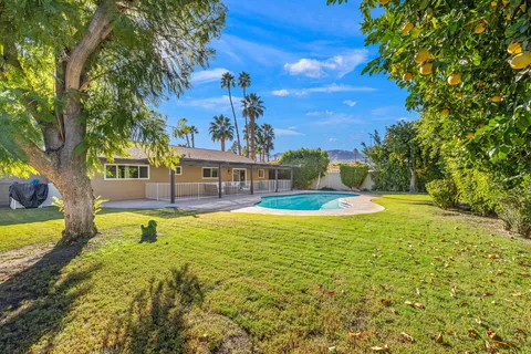 a view of a house with swimming pool