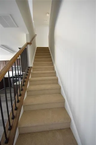 a view of storage and utility room with washer and dryer