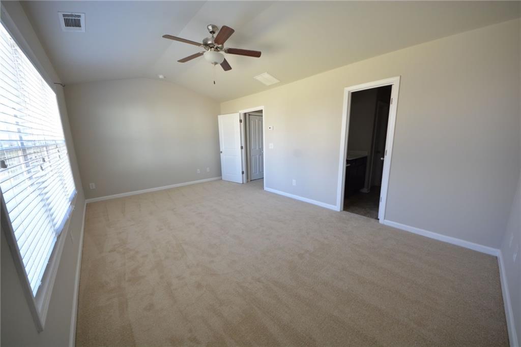 4722 Beacon Ridge Lane Flowery Branch, GA 30542 - Photo 16 of 24 a view of an empty room with a window
