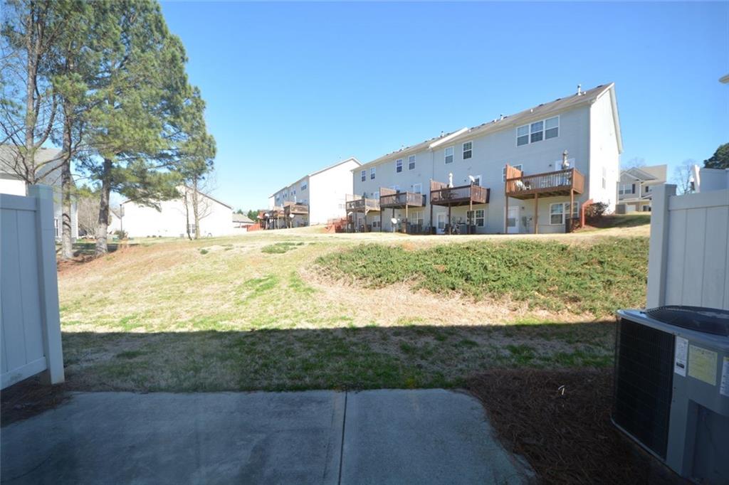 4722 Beacon Ridge Lane Flowery Branch, GA 30542 - Photo 24 of 24 a front view of house with yard