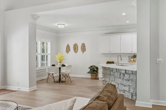 a living room with furniture and a table