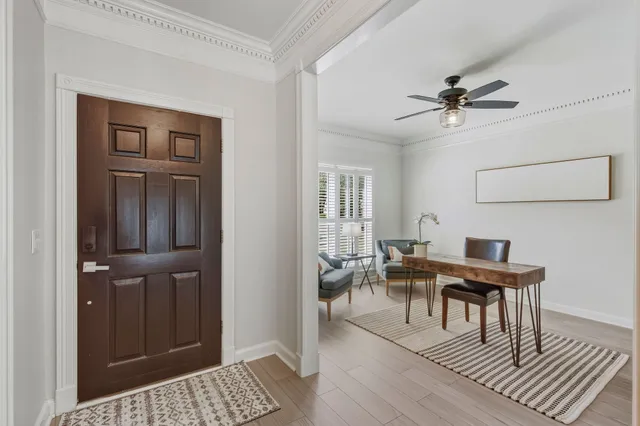 a view of a livingroom with furniture and wooden floor