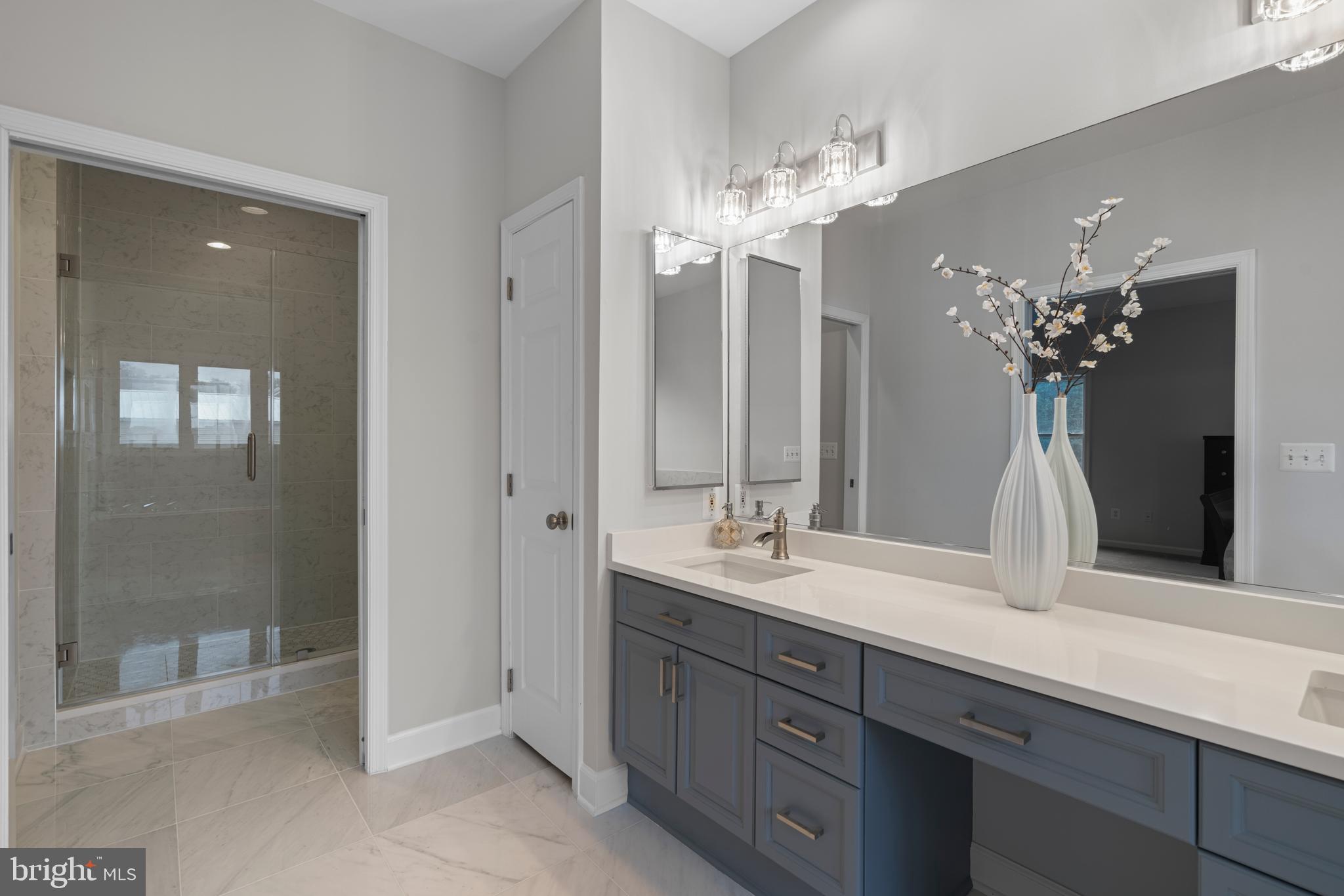 13647 Van Doren Road Manassas, VA 20112 - Photo 28 of 49 Double sinks and expansive mirrors & linen closet