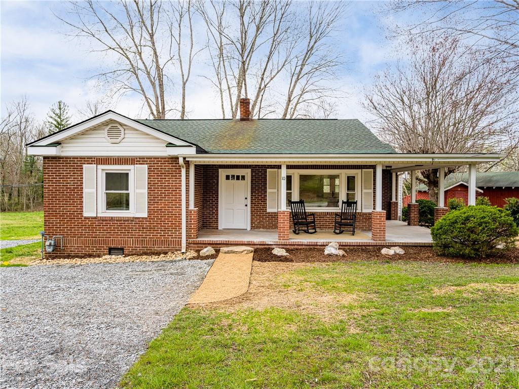10 Souther Road, Unit 2 Fletcher, NC 28732 - Photo 1 of 38 a front view of a house with swimming pool and porch