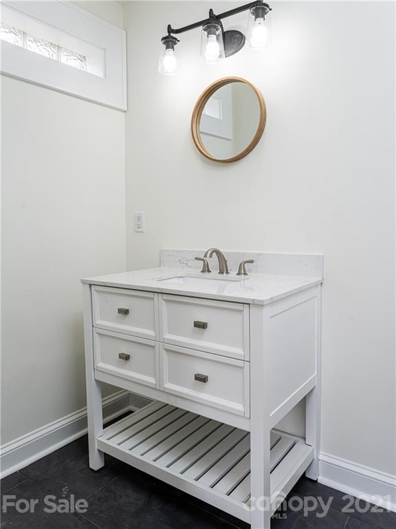 10 Souther Road, Unit 2 Fletcher, NC 28732 - Photo 14 of 38 a bathroom with a sink and a mirror