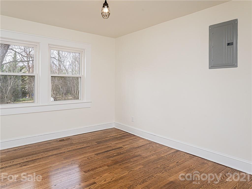 10 Souther Road, Unit 2 Fletcher, NC 28732 - Photo 17 of 38 wooden floor in an empty room with a window