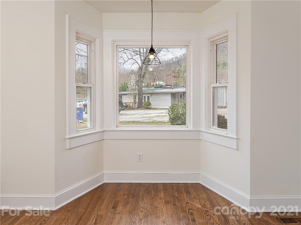 10 Souther Road, Unit 2 Fletcher, NC 28732 - Photo 20 of 38 a view of empty room with wooden floor and fan