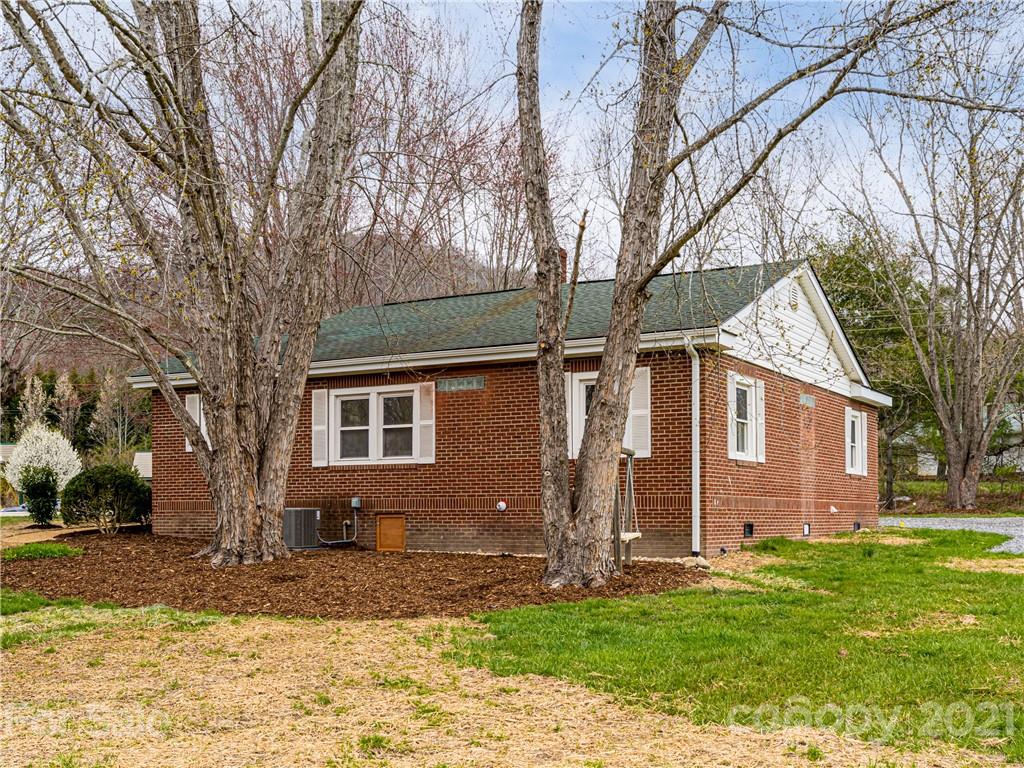 10 Souther Road, Unit 2 Fletcher, NC 28732 - Photo 24 of 38 a front view of a house with a yard