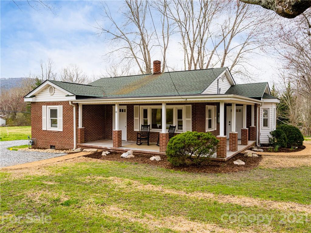10 Souther Road, Unit 2 Fletcher, NC 28732 - Photo 32 of 38 a front view of a house with yard porch and furniture