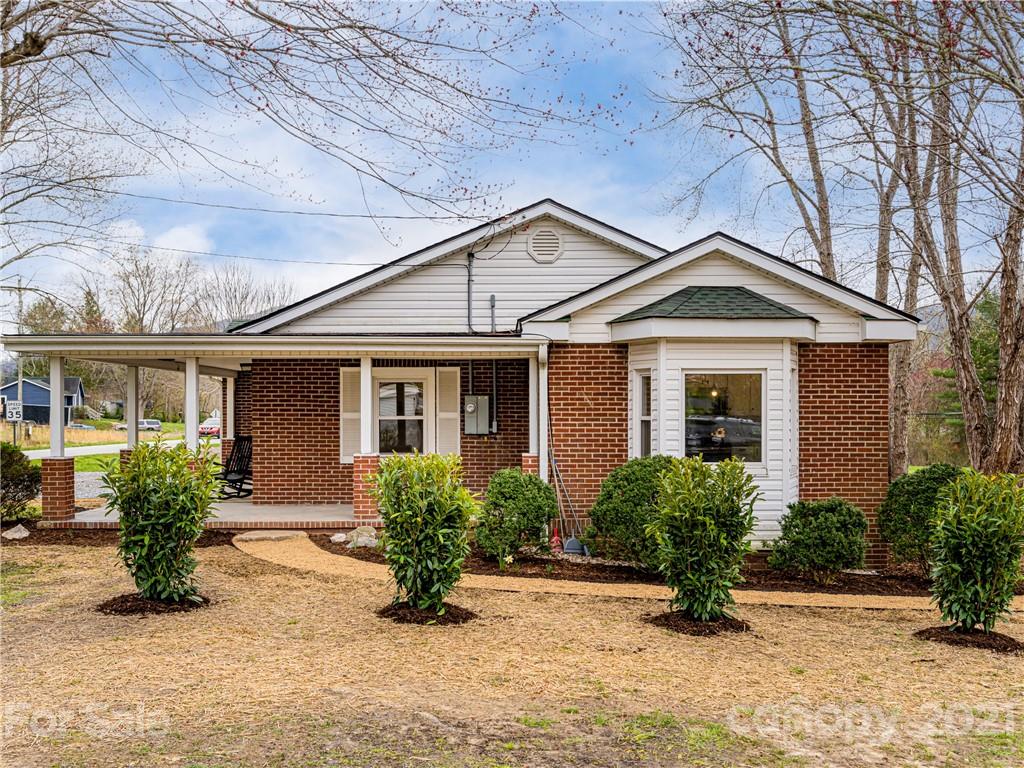 10 Souther Road, Unit 2 Fletcher, NC 28732 - Photo 37 of 38 a front view of a house with a yard