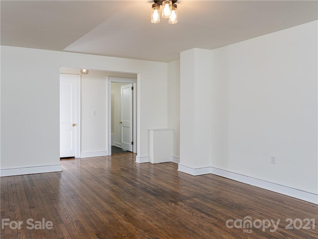 10 Souther Road, Unit 2 Fletcher, NC 28732 - Photo 5 of 38 a view of an empty room with wooden floor