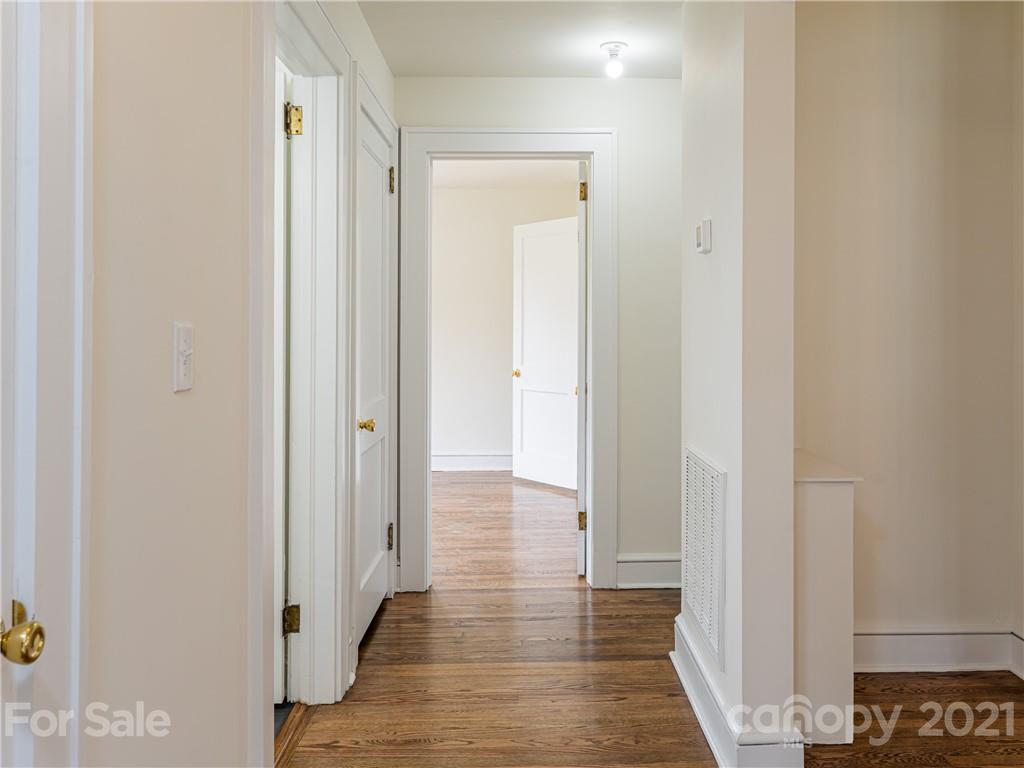 10 Souther Road, Unit 2 Fletcher, NC 28732 - Photo 9 of 38 a view of a hallway with wooden floor