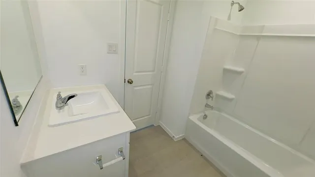 a bathroom with a sink and a bathtub