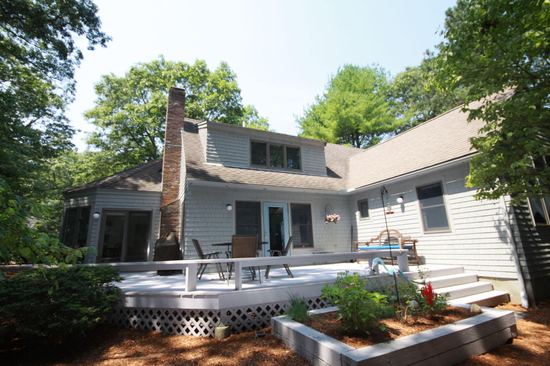 183 Fells Pond Road Mashpee, MA 02649 - Photo 18 of 19 a view of house with swimming pool and garden