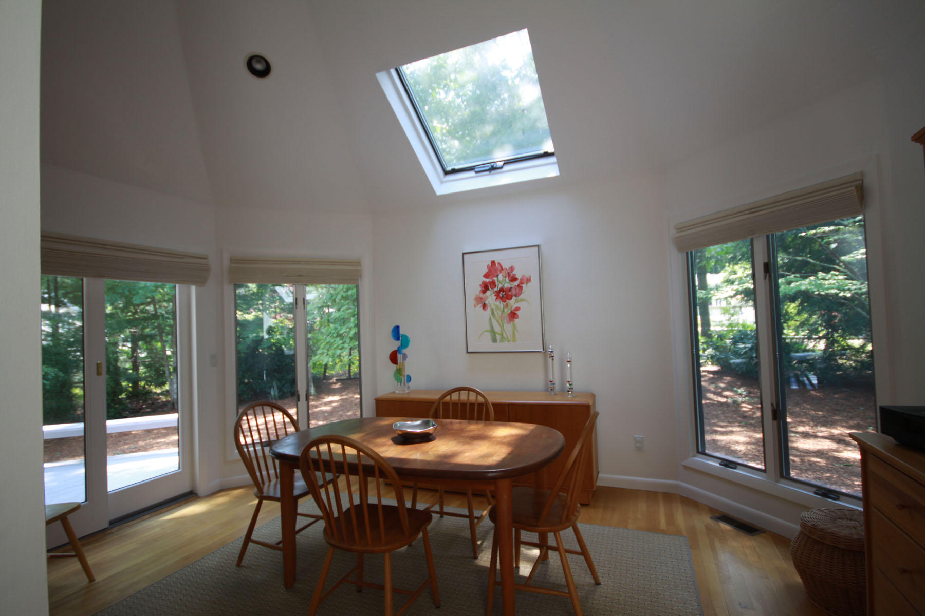 183 Fells Pond Road Mashpee, MA 02649 - Photo 5 of 19 a view of a dining room with furniture window and outside view