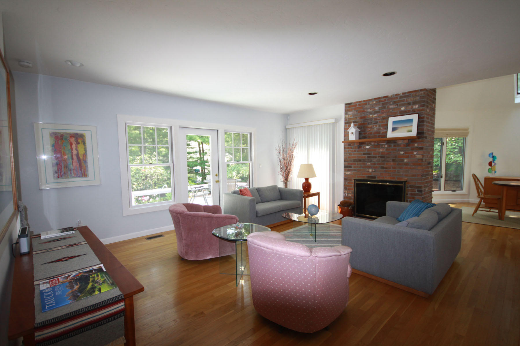 183 Fells Pond Road Mashpee, MA 02649 - Photo 6 of 19 a living room with furniture and a fireplace