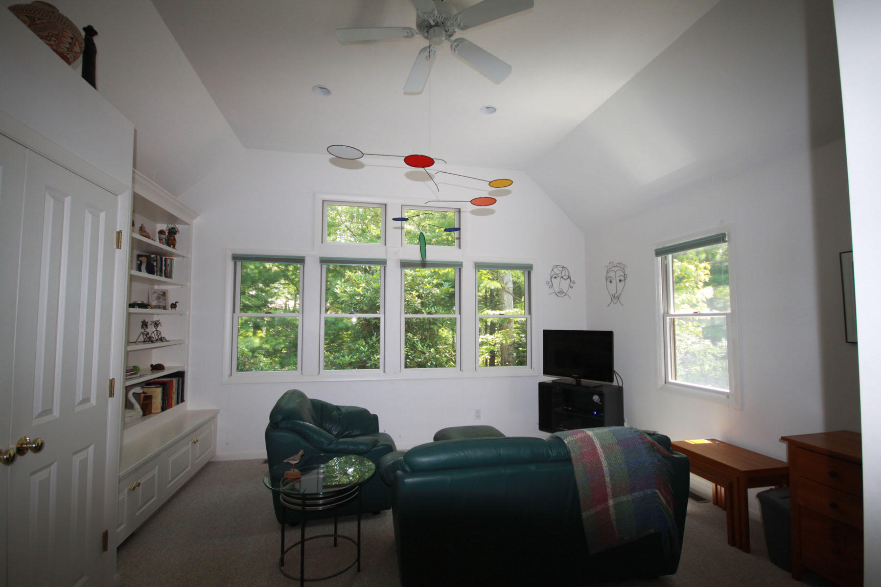 183 Fells Pond Road Mashpee, MA 02649 - Photo 9 of 19 a living room with furniture and a flat screen tv