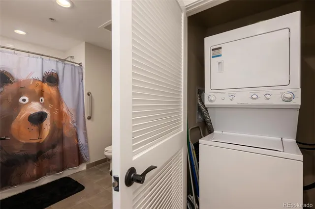a view of parking garage with lots of traffic signal