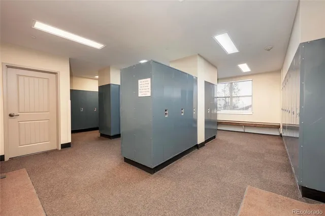 a view of a town with many cars parked