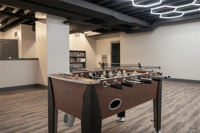 a view of a porch with furniture and a yard