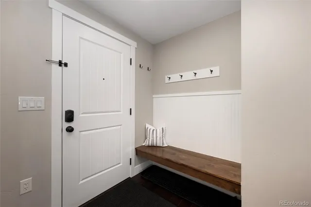 a view of hallway with closet