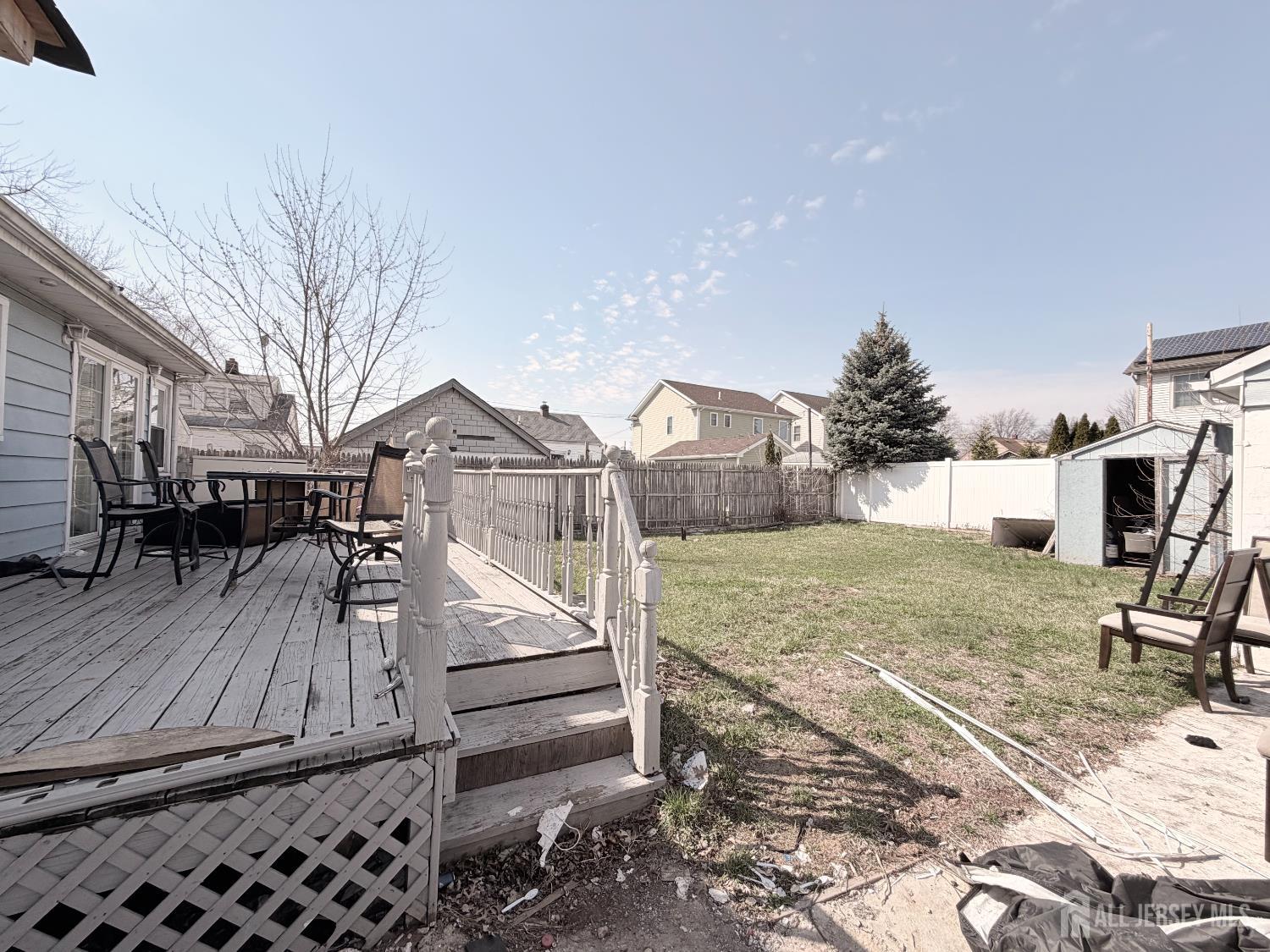 47 Spruce Street Port Reading, NJ 07064 - Photo 10 of 12 a view of a house with a yard