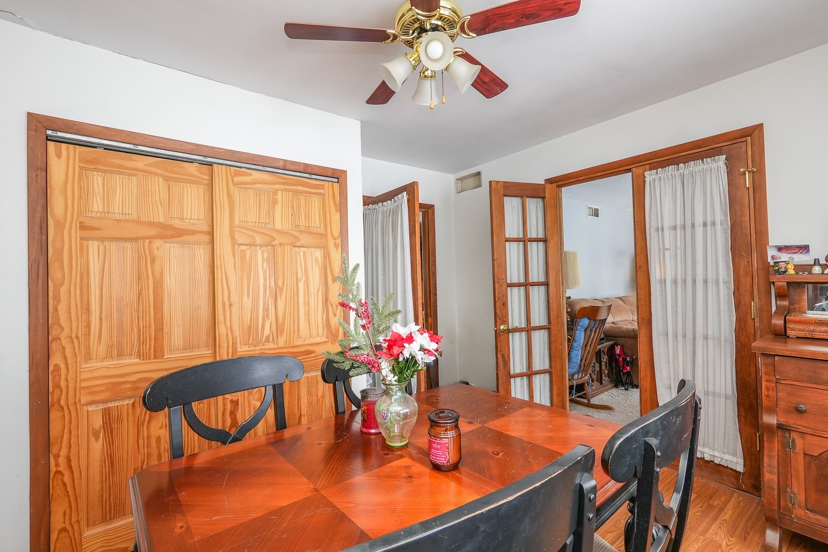 27429 South Scheer Road Manhattan, IL 60442 - Photo 12 of 21 a view of a dining room with furniture window and wooden floor