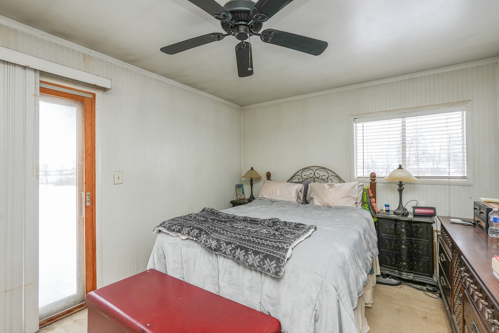 27429 South Scheer Road Manhattan, IL 60442 - Photo 20 of 21 a bedroom with a bed and dresser with mirror