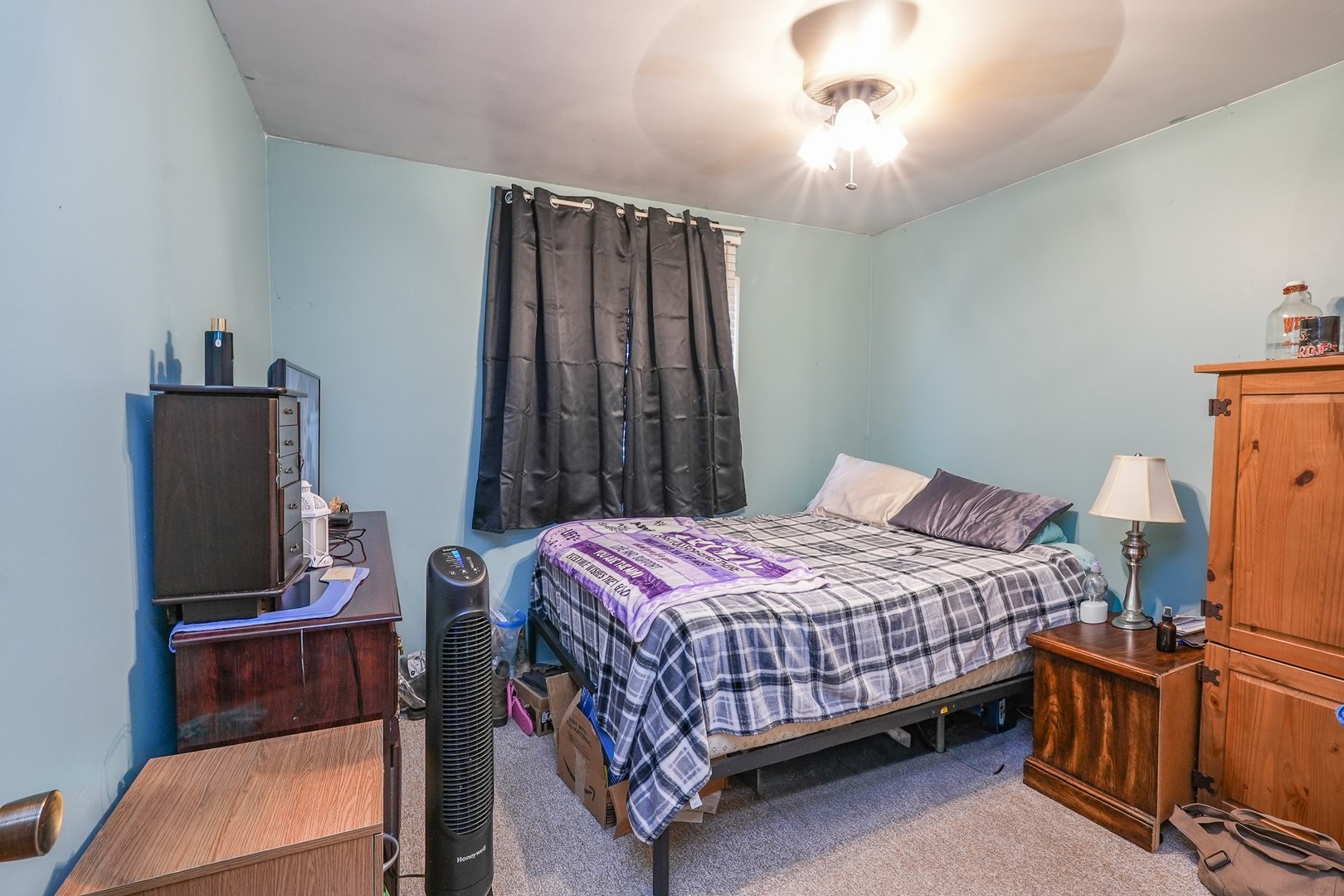 27429 South Scheer Road Manhattan, IL 60442 - Photo 21 of 21 a bedroom with a bed furniture and a flat tv screen