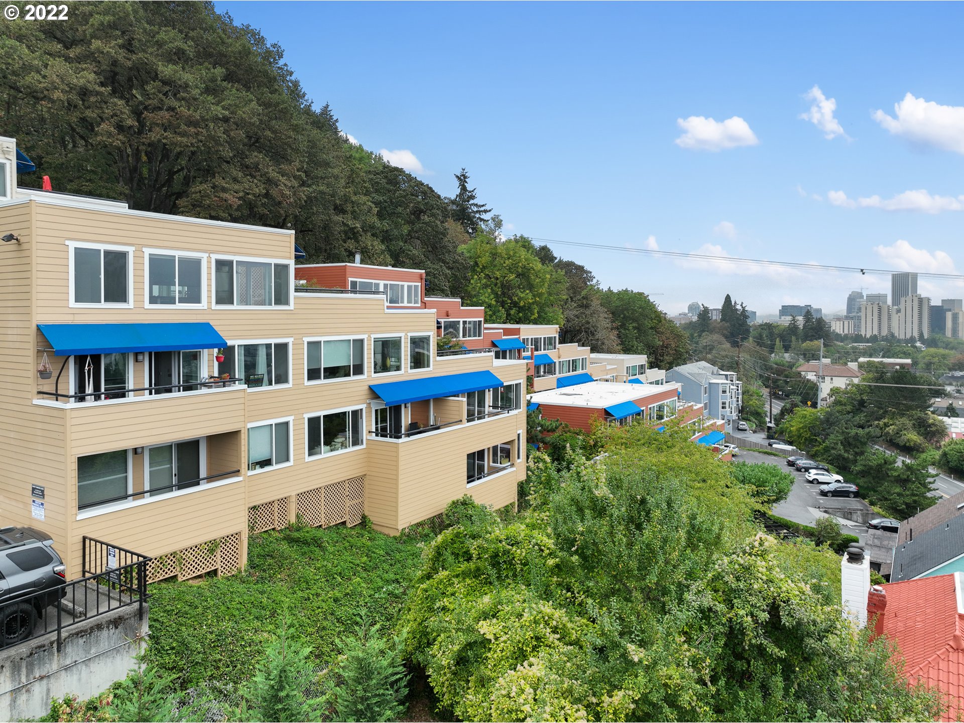 3701 Southwest Condor Avenue, Unit T3 Portland, OR 97239 - Photo 1 of 23 a view of a house with a yard and sitting area