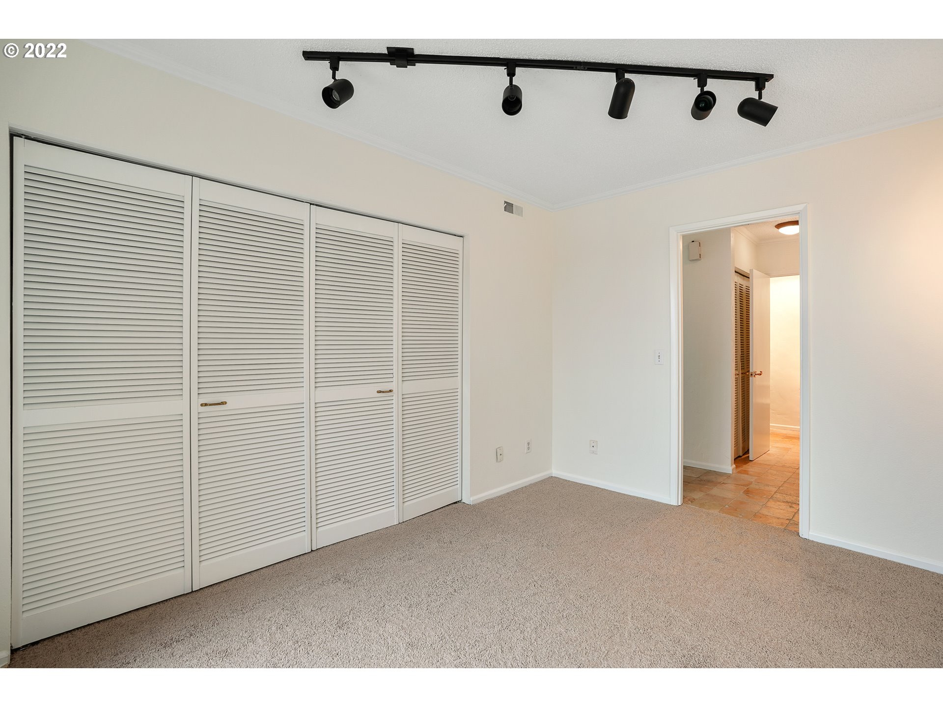3701 Southwest Condor Avenue, Unit T3 Portland, OR 97239 - Photo 13 of 23 a view of an empty room