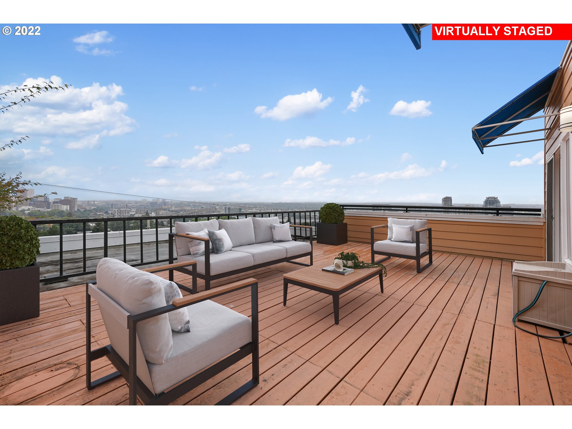 3701 Southwest Condor Avenue, Unit T3 Portland, OR 97239 - Photo 16 of 23 a outdoor living space with furniture and city view