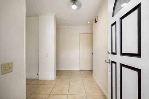a view of a hallway with closet