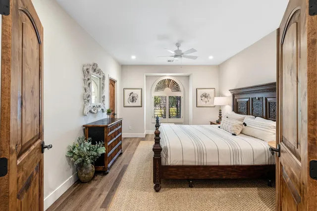 a bathroom with a granite countertop sink a shower and a mirror