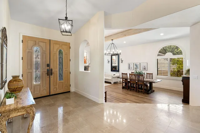 a living room with furniture fireplace and a flat screen tv
