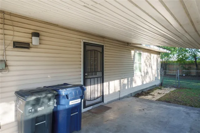 a view of a house with yard and tree s
