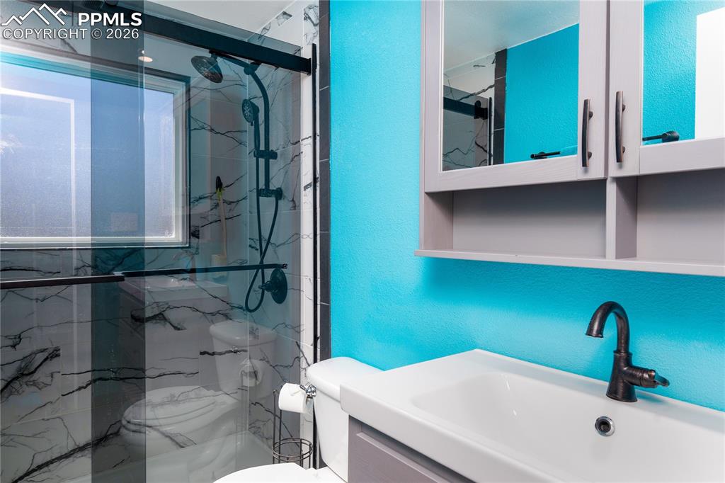 528 Camino Del Rey Fountain, CO 80817 - Photo 12 of 29 Upper Bathroom